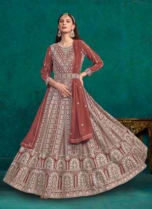 Garb These Party Wear Anarkali Suit in Fine Colored Pair With Bottom And Dupatta.These Top And Dupatta Are Fabricated On Faux Georgette Pair With Santoon Bottom.Its Beautified With Santoon Inner.Its Beautified With Designer Embroidery Work.