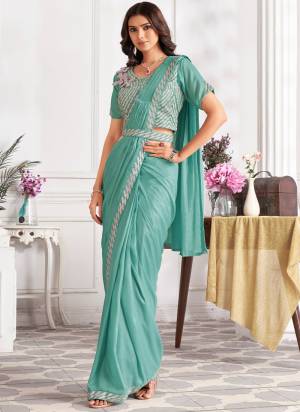 Attrective Look These Festive Wear Saree in Fine Colored.These Saree And Blouse is Fabricated On Satin Silk.Its Beautified With Designer Sequance Embroidery With Hand Work.