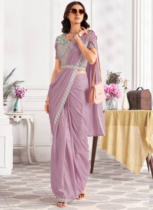 Attrective Look These Festive Wear Saree in Fine Colored.These Saree And Blouse is Fabricated On Satin Silk.Its Beautified With Designer Sequance Embroidery With Hand Work.