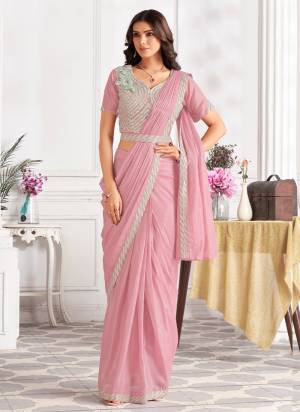 Attrective Look These Festive Wear Saree in Fine Colored.These Saree And Blouse is Fabricated On Satin Silk.Its Beautified With Designer Sequance Embroidery With Hand Work.