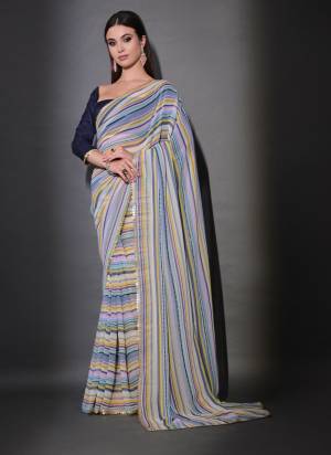 Garb These Party Wear Saree in Fine Colored.These Saree Are Georgette And Blouse is Mono Banglori Fabricated.Its Beautified With Designer Sequance Lining Embroidery Work.