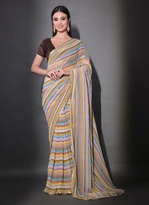 Garb These Party Wear Saree in Fine Colored.These Saree Are Georgette And Blouse is Mono Banglori Fabricated.Its Beautified With Designer Sequance Lining Embroidery Work.