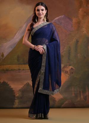 Looking These Party Wear Saree in Fine Colored.These Saree Are Georgette And Blouse is Mono Banglori Fabricated.Its Beautified With Designer Sequance Butti Embroidery Work With Lace Border.