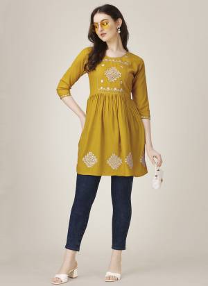 Attrective These Beautiful Looking Readymade Short Kurti.These Kurti is Fabricated On Rayon.Its Beautified With Designer Thread,Sequance Embroidery Work .