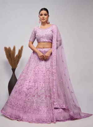 For A Fancy Designer Look,Grab These Lehenga Choli With Dupatta in Fine Colored.These Lehenga And Choli Are Soft Net And Dupatta Are Fabricated On Soft Net Pair.Its Beautified With Designer Sequance,Cut Dana Embroidery,Bead Work.