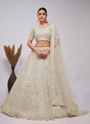 For A Fancy Designer Look,Grab These Lehenga Choli With Dupatta in Fine Colored.These Lehenga And Choli Are Soft Net And Dupatta Are Fabricated On Soft Net Pair.Its Beautified With Designer Sequance,Cut Dana Embroidery,Bead Work.