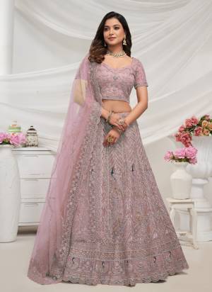 For A Fancy Designer Look,Grab These Lehenga Choli With Dupatta in Fine Colored.These Lehenga And Choli Are Soft Net And Dupatta Are Fabricated On Soft Net Pair.Its Beautified With Designer Sequance Embroidery,Stone Work.