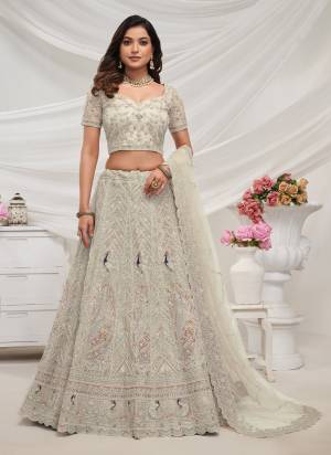 For A Fancy Designer Look,Grab These Lehenga Choli With Dupatta in Fine Colored.These Lehenga And Choli Are Soft Net And Dupatta Are Fabricated On Soft Net Pair.Its Beautified With Designer Sequance Embroidery,Stone Work.