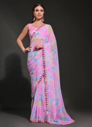 Garb These Party Wear Saree in Fine Colored.These Saree Are Georgette And Blouse is Mono Banglori Fabricated.Its Beautified With Designer Prizam Printed,Mirror Work Lace Border.