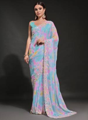 Looking These Party Wear Saree in Fine Colored.These Saree Are Georgette And Blouse is Mono Banglori Fabricated.Its Beautified With Designer Prizam Printed With C Pallu Sequance Embroidery Cut Work.