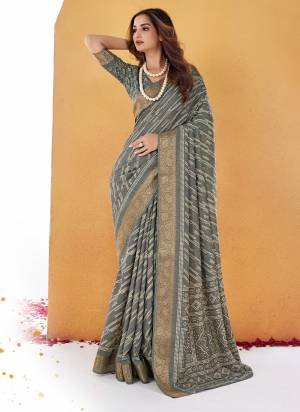 Garb These Party Wear Saree in Fine Colored.These Saree And Blouse is Fabricated On Dolla Silk Pair.Its Beautified With Wevon Jari Border Designer With Designer Printed.