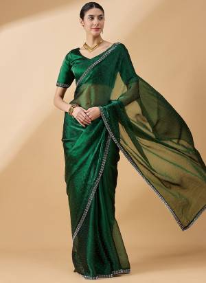 Garb These Designer Party Wear Saree in Fine Colored.These Saree And Blouse Organza is Fabricated.Its Beautified Desiger Swarovski,Stone Work.