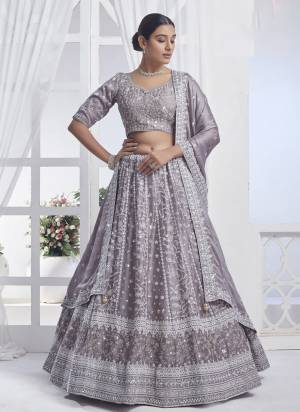 For A Designer Look,Grab These Lehenga Choli in Fine Colored.These Lehenga And Blouse Are Fabricated On Chiffon Pair With Chiffon Dupatta.Its Beautified With Designer Multy Thread,Sequance Embroidery Work.