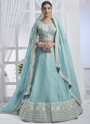 For A Designer Look,Grab These Lehenga Choli in Fine Colored.These Lehenga And Blouse Are Fabricated On Organza Pair With Organza Dupatta.Its Beautified With Designer Multy Thread,Sequance Embroidery Work.