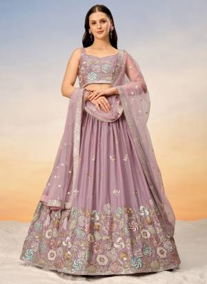 Attrective Looking This Partywear Fine Color Heavy Designer Choli And Lahenga Georgette And Dupatta Net In Fabricated Beautified With Attrective Designer Thread,Sequance Embroidery Work. Buy Now.