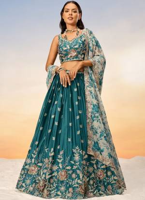 Attrective Looking This Partywear Fine Color Heavy Designer Choli And Lahenga Chiffon And Dupatta Net In Fabricated Beautified With Attrective Designer Thread,Sequance Embroidery Work. Buy Now.