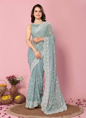 Looking These Party Wear Saree in Fine Colored.These Saree Are Georgette And Blouse is Art Silk Fabricated.Its Beautified With Designer Thread,Sequance Embroidery Work.