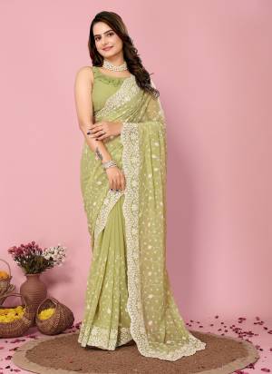 Looking These Party Wear Saree in Fine Colored.These Saree Are Georgette And Blouse is Art Silk Fabricated.Its Beautified With Designer Thread,Sequance Embroidery Work.