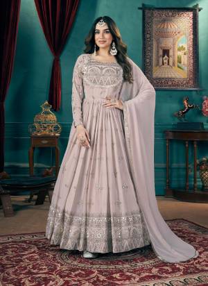 Attrective These Beautiful Looking Designer Gown With Dupatta.These Gown And Dupatta Is Fabricated On Faux Georgette.Its Beautified With Designer Metalic Foil Work.