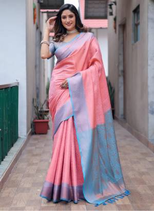 Garb These Party Wear Saree in Fine Colored.These Saree And Blouse is Fabricated On Kanjivaram Silk.Its Beautified With Weavon Copper Jari Designer.