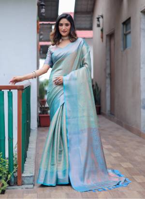 Garb These Party Wear Saree in Fine Colored.These Saree And Blouse is Fabricated On Kanjivaram Silk.Its Beautified With Weavon Copper Jari Designer.