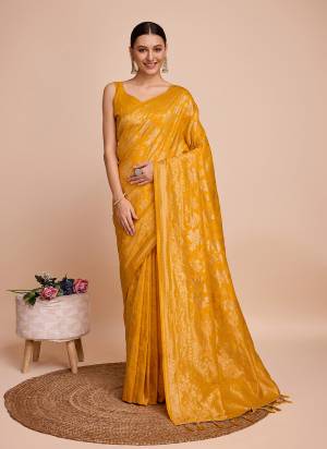 Garb This Partywear Saree Paired With Blouse.This Saree And Blouse Are Handloom Silk Based Fabric With Weaving Copper Jari Designer. Buy This Pretty Saree Now.