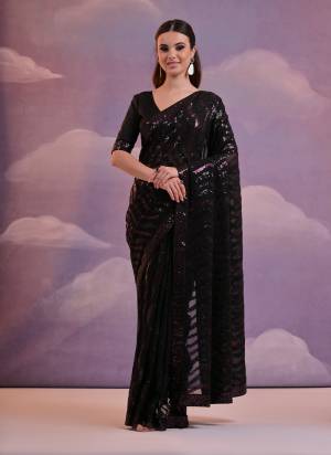 Garb These Party Wear Saree in Fine Colored.These Saree Are Georgette And Blouse is Mono Banglori Fabricated.Its Beautified With Designer Laheriya Style Sequance Embroidery Work.