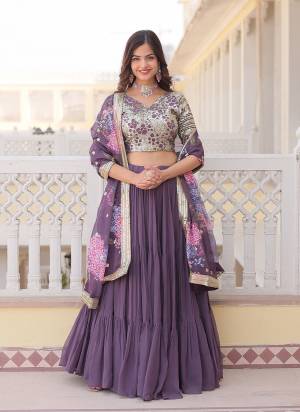 For A Designer Look,Grab These Lehenga Choli in Fine Dusty Colored.These Lehenga And Blouse Are Fabricated On Faux Georgette Pair With Russion Silk Dupatta.Its Beautified With Designer Heavy Sequance Embroidery Work,Printed Dupatta.