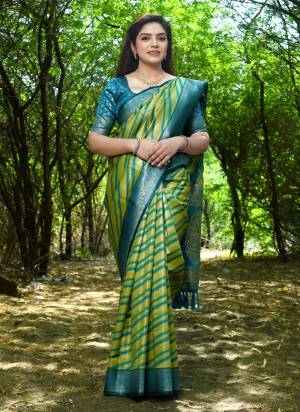 Looking These Festive Wear Saree in Fine Colored.These Saree And Blouse is Fabricated On Soft Silk.Its Beautified With Wevon Jari Laheriya Designer.