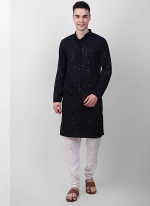 Garb These Designer Mens Wear Kurta.Its Cotton Fabriced.Its Designer Thread,Sequance Embroidery Work