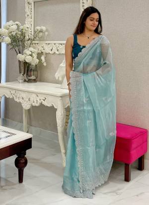 Garb These Party Wear Saree in Fine Colored.These Saree Are Burberry Silk And Blouse is Diamond Silk Fabricated.Its Beautified With Designer Silver Jari,Sequance Embroidery Work.