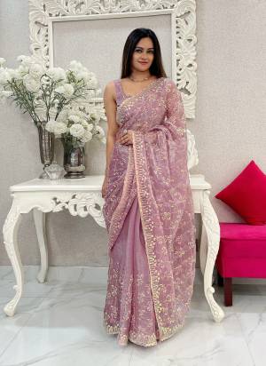 Attrective These Party Wear Saree in Fine Colored.These Saree Are Jimmy Choo Silk And Blouse is Jimmy Choo Silk Fabricated.Its Beautified With Designer Golden Jari,Sequance Embroidery Work.