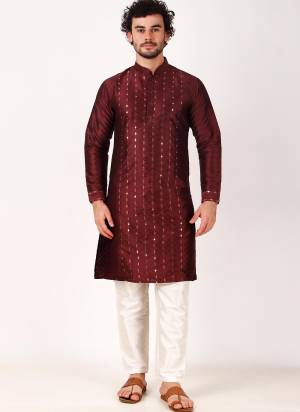 Garb These Designer Mens Wear Kurta With Bottom.Its Kurta And Bottom Are Art Silk Fabriced.Its Designer Mirror Embroidery Work.