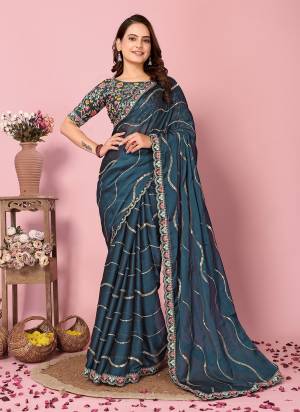 Garb These Party Wear Saree in Fine Colored.These Saree Are Rangoli Silk And Blouse is Art Silk Fabricated.Its Beautified With Designer Multy Thread,Sequance Embroidery Work.