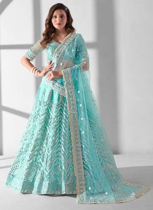 For A Designer Look,Grab These Lehenga Choli in Fine Colored.These Lehenga And Blouse Are Fabricated On Net Pair With Net Dupatta.Its Beautified With Designer Gota Patti,Sequance Embroidery Work.