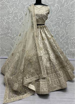 For A Fancy Designer Look,Grab These Lehenga Choli With Dupatta in Fine Colored.These Lehenga And Choli Are Silk And Dupatta Are Fabricated On Soft Net Pair.Its Beautified With Designer Sequance Touch Up,Dori,Chapat Jari Embroidery, Diamond Work.