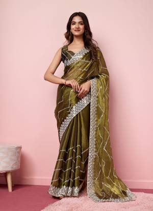 Garb These Party Wear Saree in Fine Colored.These Saree Are Burberry Silk And Blouse is Art Silk Fabricated.Its Beautified With Designer Sequance Embroidery Work.