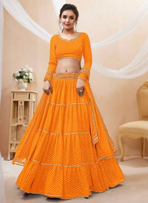 For A Designer Look,Grab These Lehenga Choli in Fine Colored.These Lehenga Are Georgette And Blouse Are Fabricated On Georgette Pair With Dupatta Are Georgette.Its Beautified With Designer Laheriya Printed With Lace.