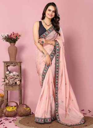 Looking These Party Wear Saree in Fine Colored.These Saree Are Organza And Blouse is Art Silk Fabricated.Its Beautified With Designer Coding,Sequance Embroidery Work With Printed Blouse.