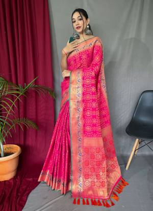 Attrective This Partywear Saree Paired With Blouse.This Saree And Blouse Are Patola Silk Based Fabric With Weaving Jacquard Jari Designer. Buy This Pretty Saree Now.