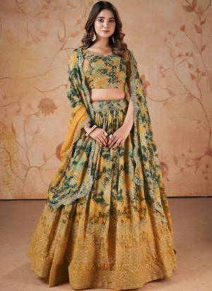 For A Designer Look,Grab These Lehenga Choli in Fine Colored.These Lehenga And Blouse Are Fabricated On Faux Georgette Pair With Faux Georgette Dupatta.Its Beautified With Digital Printed,Jari, Sequance Embroidery Work.