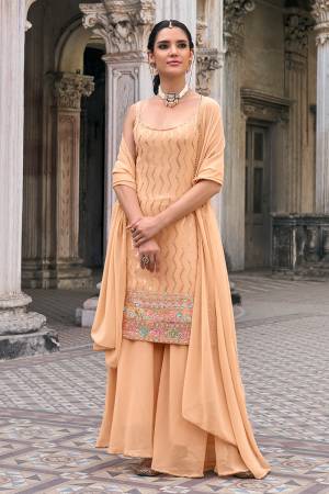 Attrective These Sharara Suit in Fine Colored Pair With Bottom And Dupatta.These Top And Dupatta Are Fabricated On Faux Georgette Pair With Faux Georgette Bottom.Its Beautified With Designer Multy Thread,Sequance Embroidery Work.