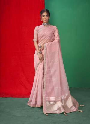 Looking These Party Wear Saree in Fine Colored.These Saree Are Organza And Blouse is Fabricated On Organza.Its Beautified With Wevon Lining Designer With Coding,Sequance,Gota Patti Embroidery Work.