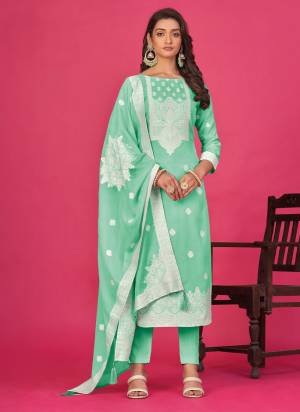 Garb These Suit in Fine Colored Pair With Bottom And Dupatta.These Top And Dupatta Are Fabricated On Organza Pair With Muslin Bottom.Its Beautified With Wevon Designer With Baadla Work.