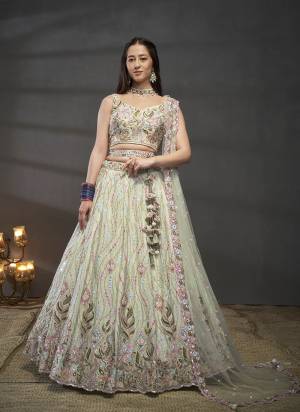 Attrective Looking This Partywear Fine Color Heavy Designer Choli Fabric Chiffon And Lahenga Chiffon And Dupatta Net In Fabricated Beautified With Attrective Designer Coding,Sequance,Mirror Embroidery,Zarkan Work. Buy Now.