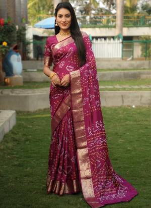 Garb These Festive Wear Saree in Fine Colored.These Saree And Blouse is Fabricated On Handloom Silk.Its Beautified With Wevon Border Designer With Handmade Bandhej Printed.