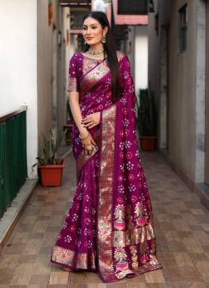 Looking These Party Wear Saree in Fine Colored.These Saree And Blouse is Fabricated On Dola Silk.Its Beautified With Wevon Matha Border Pallu Designer With Hand Made Bandhej Printed.