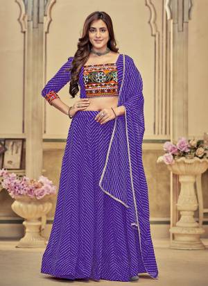 Grab These Navratri Special Lehenga Choli in Fine Colored.These Lehenga Are Georgette Choli Are Georgette And Dupatta Are Fabricated On Georgette Pair.Its Beautified With Designer Thread,Mirror Embroidery Work.