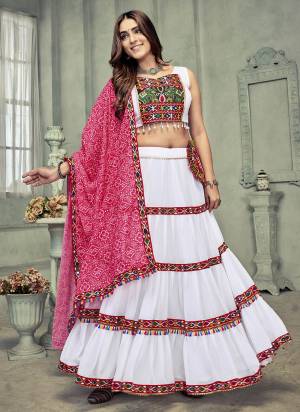 Looking These Navratri Special Lehenga Choli in Fine Colored.These Lehenga Are Georgette Choli Are Georgette And Dupatta Are Fabricated On Georgette Pair.Its Beautified With Designer Thread,Mirror Embroidery Work.