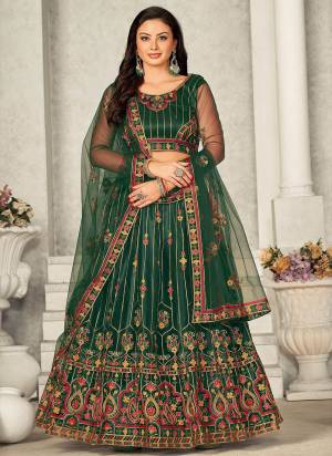 Garb These Partywear Lehenga Choli in Fine Colored.These Lehenga Are Net Choli Are Net And Dupatta Are Fabricated On Net Pair.Its Beautified With Designer Embroidery Work.